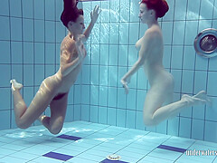 Katrin Swims And Strips Lucy In The Swimming Pool